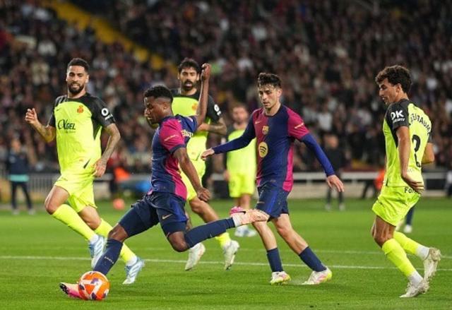 包含皇马门将连续扑出关键球，球队士气高昂的词条